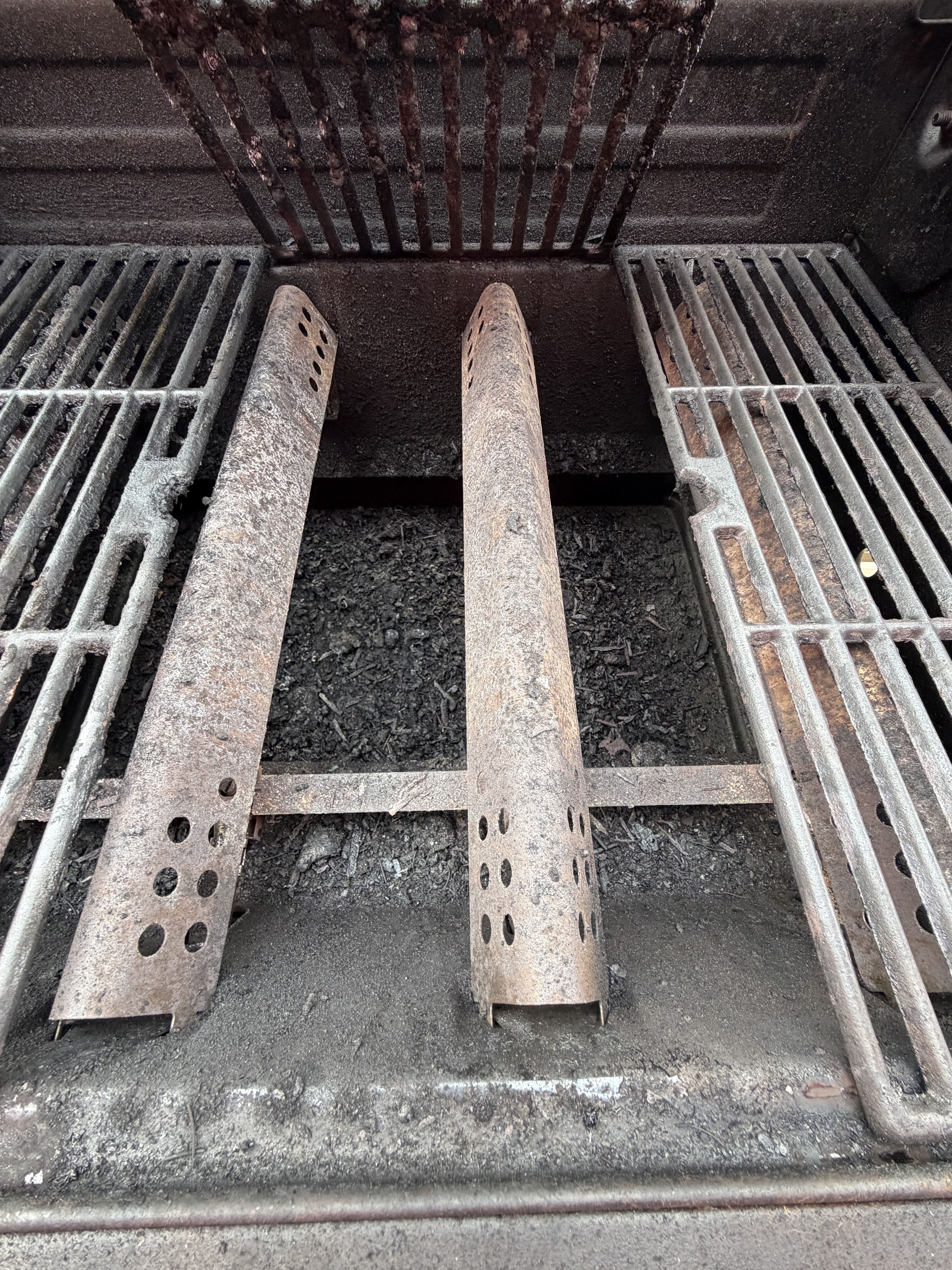 Dirty BBQ firebox before cleaning